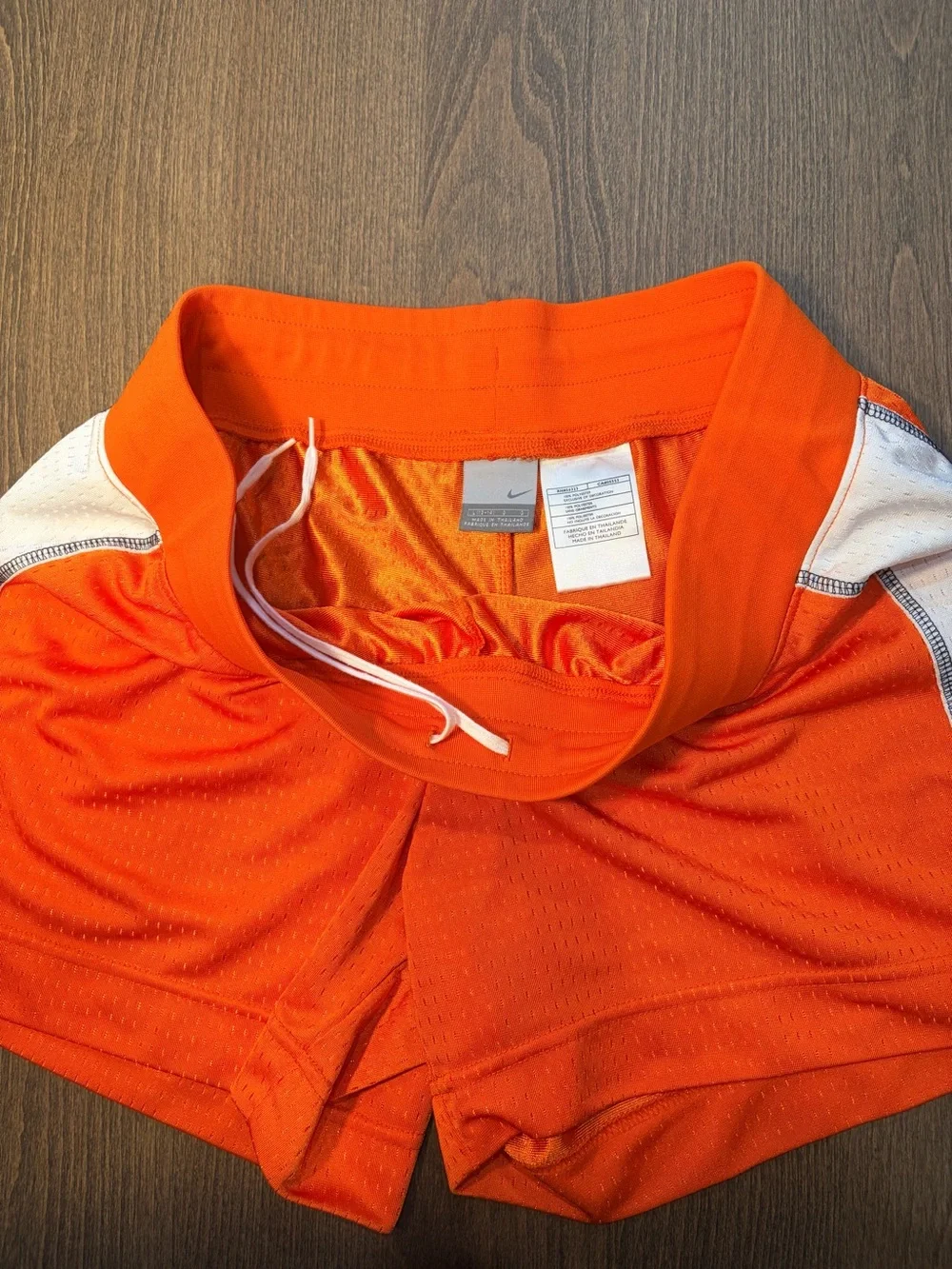 Nike Women's Orange Mesh Athletic Shorts with White Side Panels